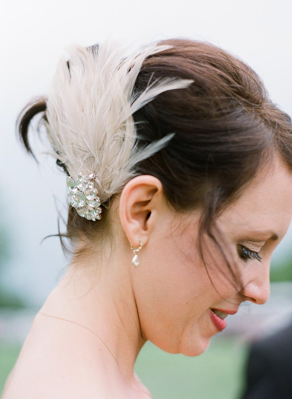 Lovely ivory and feathered bridal hair accessory - wedding photo by top Austin based wedding photographers Q Weddings